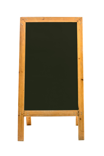 Sandwich blackboard in wooden framed stand. Isolated on white, clipping path included. You can add your own text. Copy space. Vertical orientation. The  menu board was standing in a street, outside of a restaurant. A high resolution DSLR-image with the dimensions of 3755 px × 5627 px 