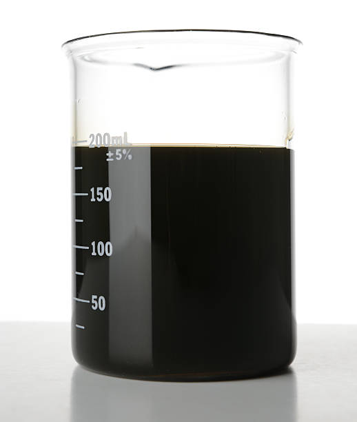 istock Beaker of Used Motor Oil 174914553