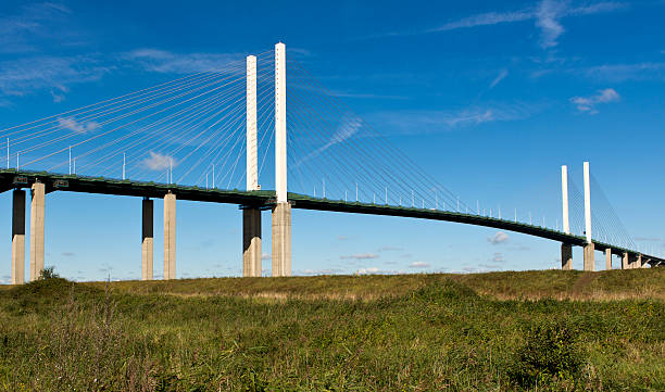 Dartford Crossing The Queen Elizabeth 2nd Bridge links the M25 motorway across the Thames from Kent to Essex. essex england photos stock pictures, royalty-free photos & images