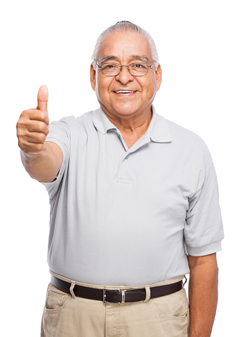 Cheerful senior man making thumbs up