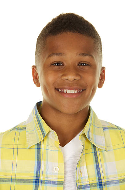 istock Portrait Handsome Smiling African American Boy on White Background 174915051