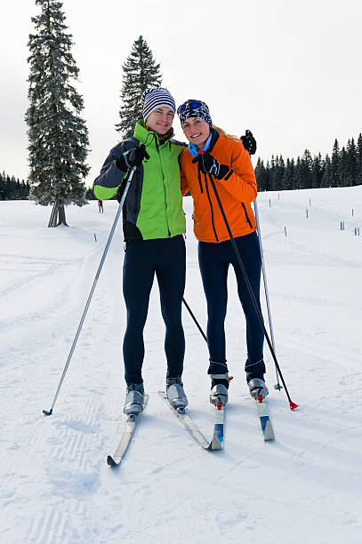 istock Young couple posing after cross country skiing 174915325