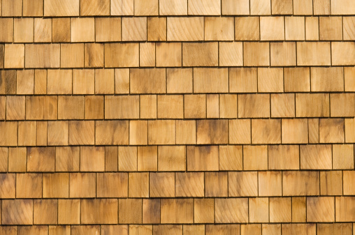 Close up pattern of wooden roof shingles.