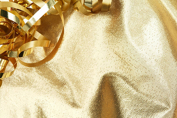 istock Gold ribbons and satin 174915837