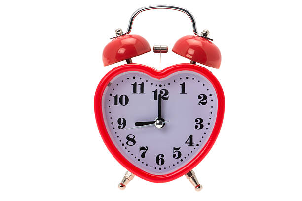 istock Alarm clock in the shape of a red heart 174915895