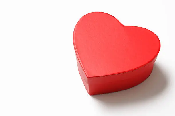Photo of Isolated shot of red heart shape box on white background
