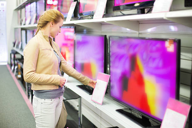 istock woman buys the TV 174916019
