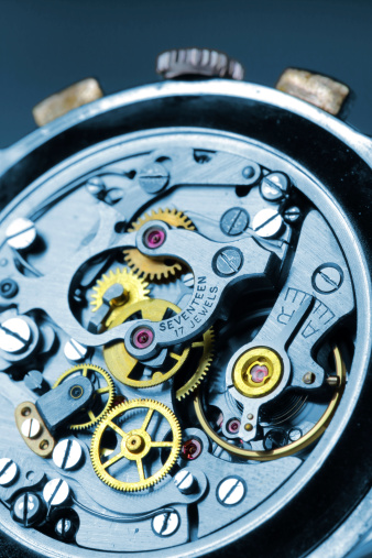 Gears and rubies inside an wrist watch.  Other images in: