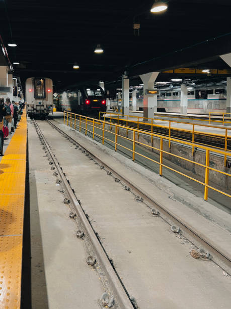 Train Station Platform with Passengers Waiting to Board