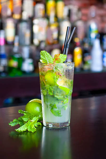 istock mojito mint rum cocktail on the classic black bar table 174916457