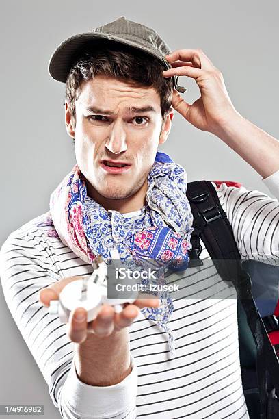 Confused Male Traveller Stock Photo - Download Image Now - Asking, Electric Plug, 20-24 Years