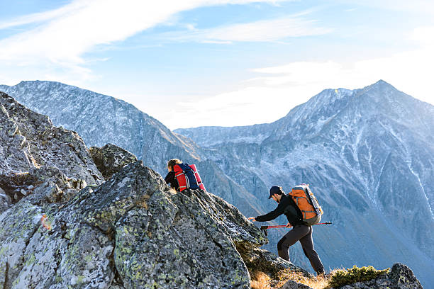 istock hikers up in the mountains 174917167