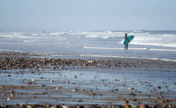 surfer sur la plage - Photo