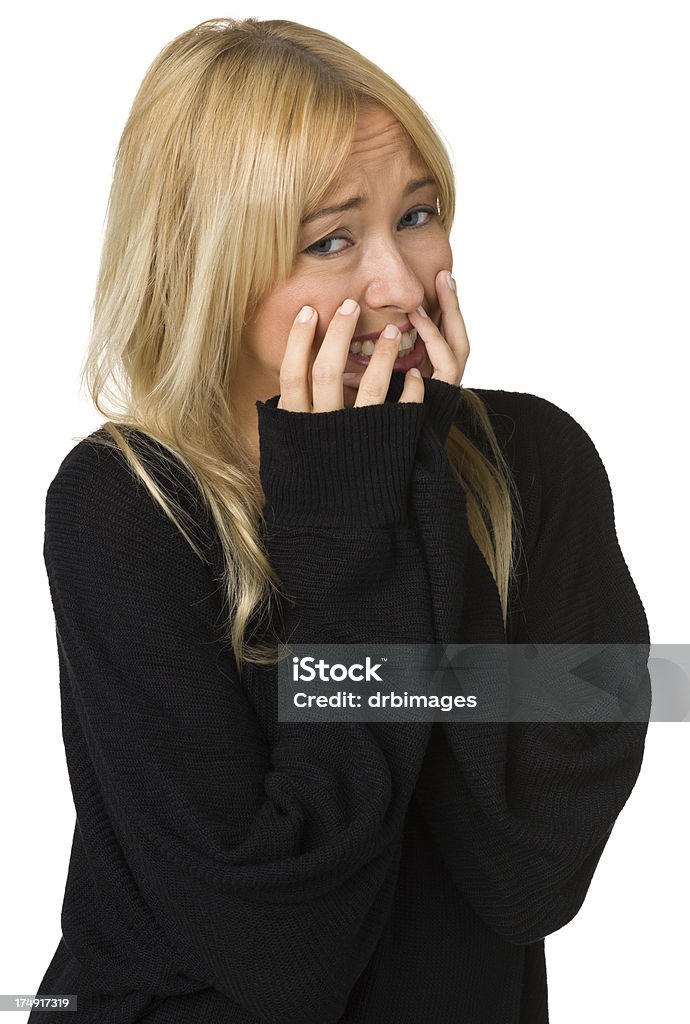 Nerwowy członka Młoda kobieta, obejmujące usta z rękami - Zbiór zdjęć royalty-free (Czarny kolor)