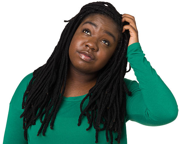 istock Uncertain Young Woman Looking Up, Scratching Head 174917400