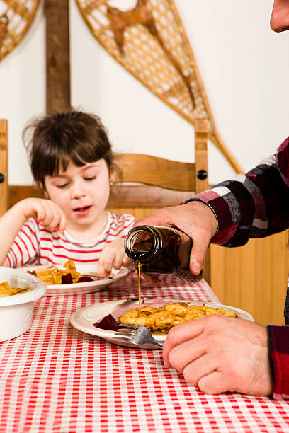 istock Little girl eat at sugar shack 174917466