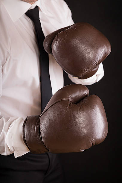 istock businessman with boxing gloves 174917541