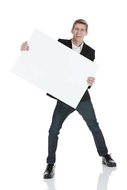 istock Happy businessman holding a placard 174917911