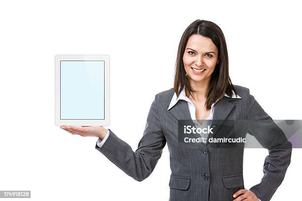 Businesswoman Holding Digital Tablet Computer Foto de stock y más banco de imágenes de 30-39 años - 30-39 años, Adulto, Adulto joven