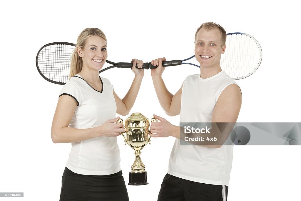 Sucesso jogadores de tênis com o troféu - Foto de stock de 20 Anos royalty-free