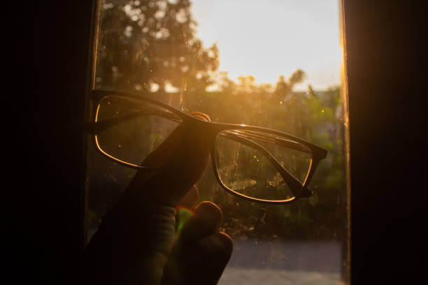 The middle part of the glasses frame is held