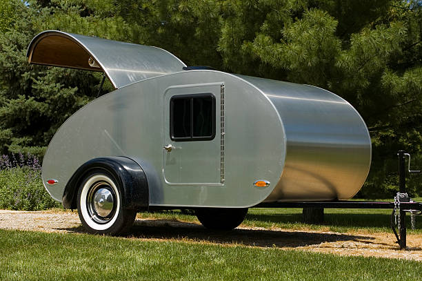 Teardrop Trailer A classic teardrop trailer with its hatch open teardrop camper stock pictures, royalty-free photos & images