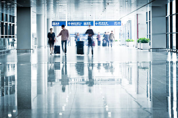 istock People Rushing through a Airport 174918672