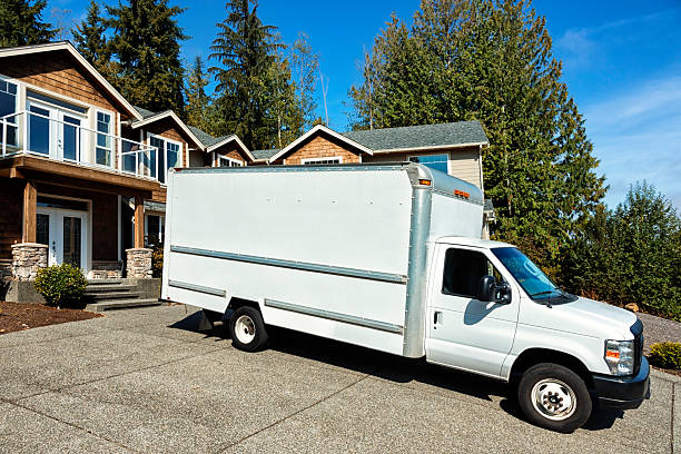 istock Plain White Moving Truck in Driveway 174918683
