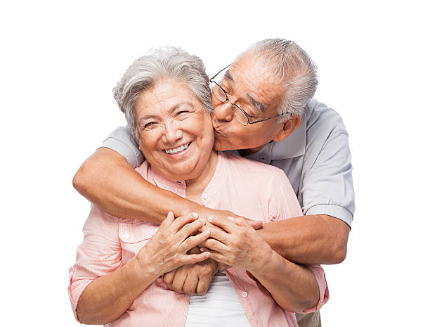 podekscytowany starszy kobieta coraz pocałunek w policzek - latin american and hispanic ethnicity senior adult mature adult couple zdjęcia i obrazy z banku zdjęć
