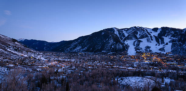 Aspen Colorado Town and Ski Slopes at Dusk stock photo
