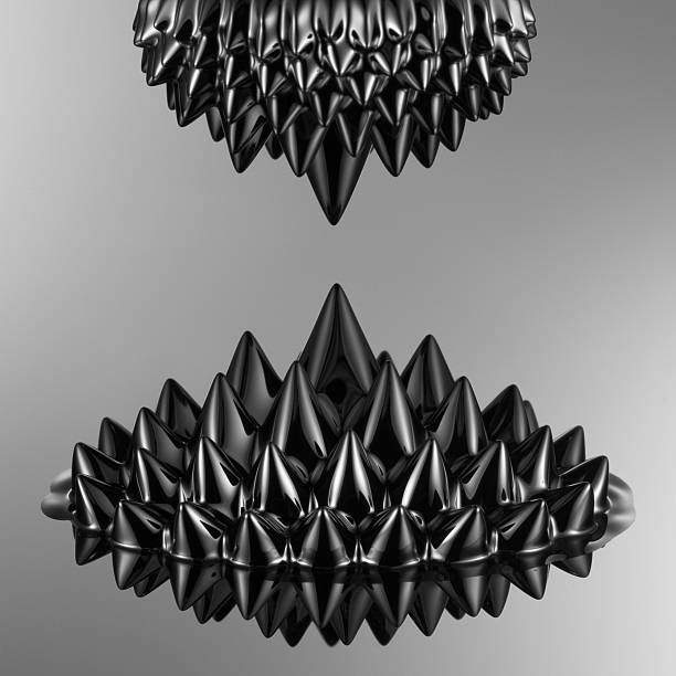 magnetostatic attraction "two magnets compete for ferrofluid, which is trying to bring them together" scientific experiment magnetic field ferro ferrofluid stock pictures, royalty-free photos & images