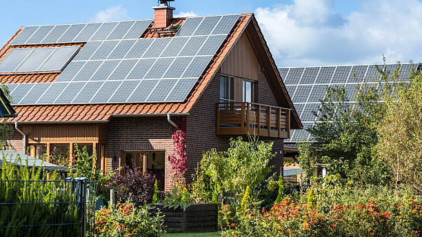 Houses with solar panels Houses with solar panels solar power station solar panel house solar energy stock pictures, royalty-free photos & images