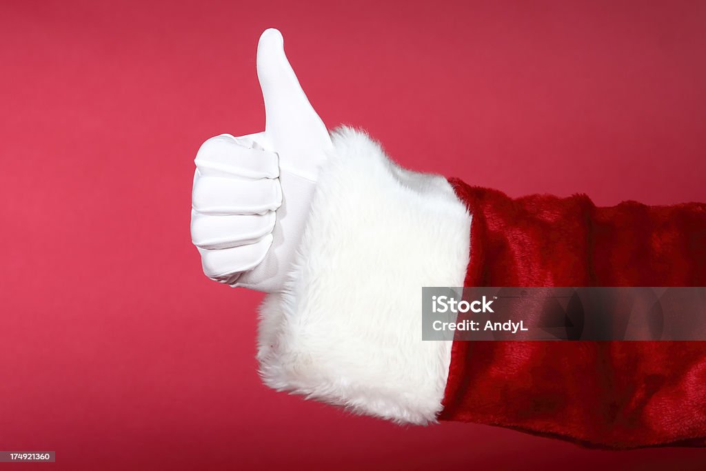 Santa mains: Pouce levé - Photo de Père Noël libre de droits