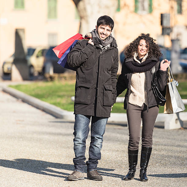 istock happiness couple walking with shopping bag 174921916