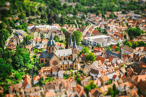 Toy city - Heppenheim in Germany A small town seen from above with tilt-shift effect. Heppenheim and Church St. Peter in Germany. odenwald photos stock pictures, royalty-free photos & images