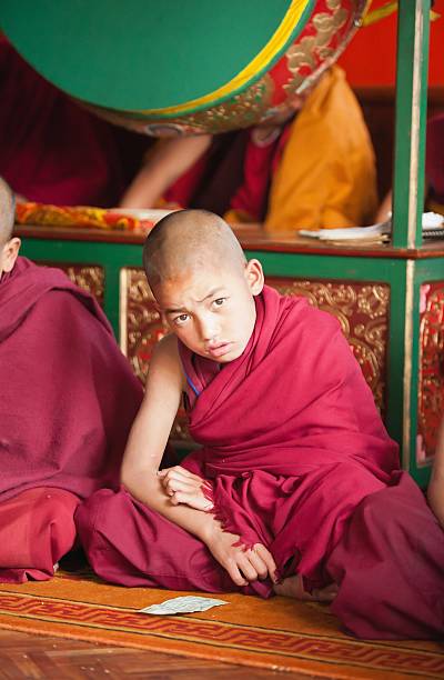 istock Little Monk and Money 174923066