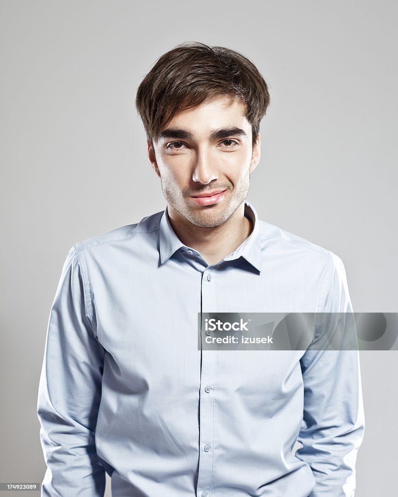 Businessman Portrait of young businessman smiling at the camera. 25-29 Years Stock Photo