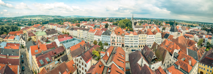 180 degree panorama from the city square Braunau. Taken from the tower of the parish church of Braunau. Braunau is the oldest and largest town in Upper Austria Innviertel with 16 182 inhabitants (as of January 1, 2011) and is located about 60 km from Salzburg and each about 120 km from Munich and Linz. It is capital of the district Braunau am Inn, and forms with the opposite city Simbach am Inn in Bavaria, a cross-border regional center. Braunau is the birthplace of Adolf Hitler.