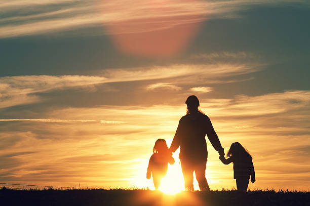istock Family walking at Sunset 174923533