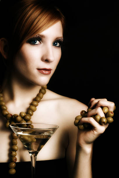 Woman with Olives young woman (twenty-one) with olives. Softened and colorized. modelce stock pictures, royalty-free photos & images