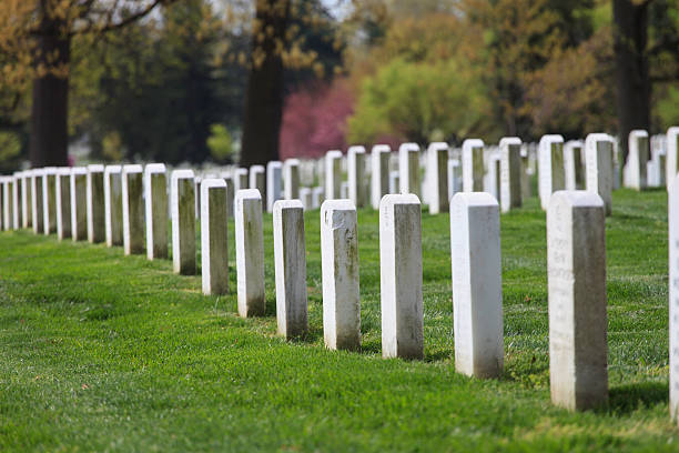 Arlington Graves Rows of grave stones at Arlington National Cemetery. arlington cemetery in spring stock pictures, royalty-free photos & images