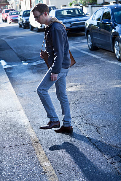 istock Man walking across street 174924209