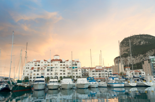 Gibralter marina with the Rock of Gibralter at sunrise