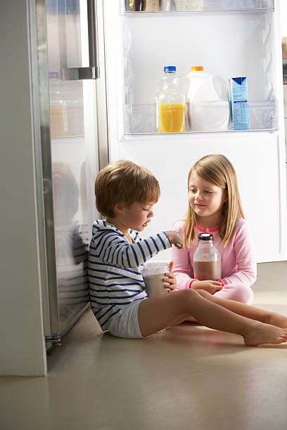istock Children Raiding The Fridge 174924470