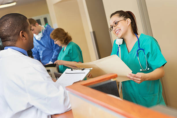 Nurses With Multiple Task 10+ Nurse Nurses Station Crowded Multi Tasking Stock Photos, Pictures ...