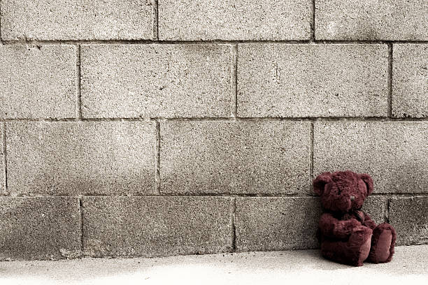 Baby hand on pink wall