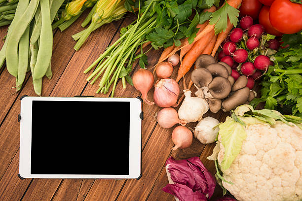 istock organic food mix with digital tablet 174925263