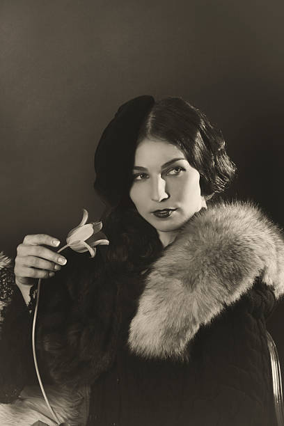 istock 1940s style.Lady with flower 174925811