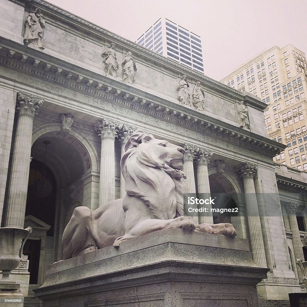 Lion in front of the New York Public Library Lion in front of the New York Public Library. Picture taken with mobile phone. New York Public Library Stock Photo