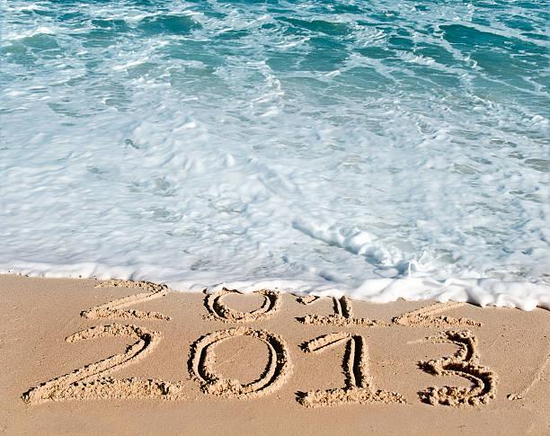 nowy rok przy plaży 2013 r. - 2013 beach sand new years day zdjęcia i obrazy z banku zdjęć